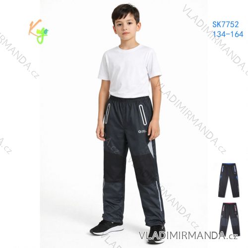 Nohavice šusťákové podšité bavlnou dorast dievčenské a chlapčenské (134-164) KUGO SK7752